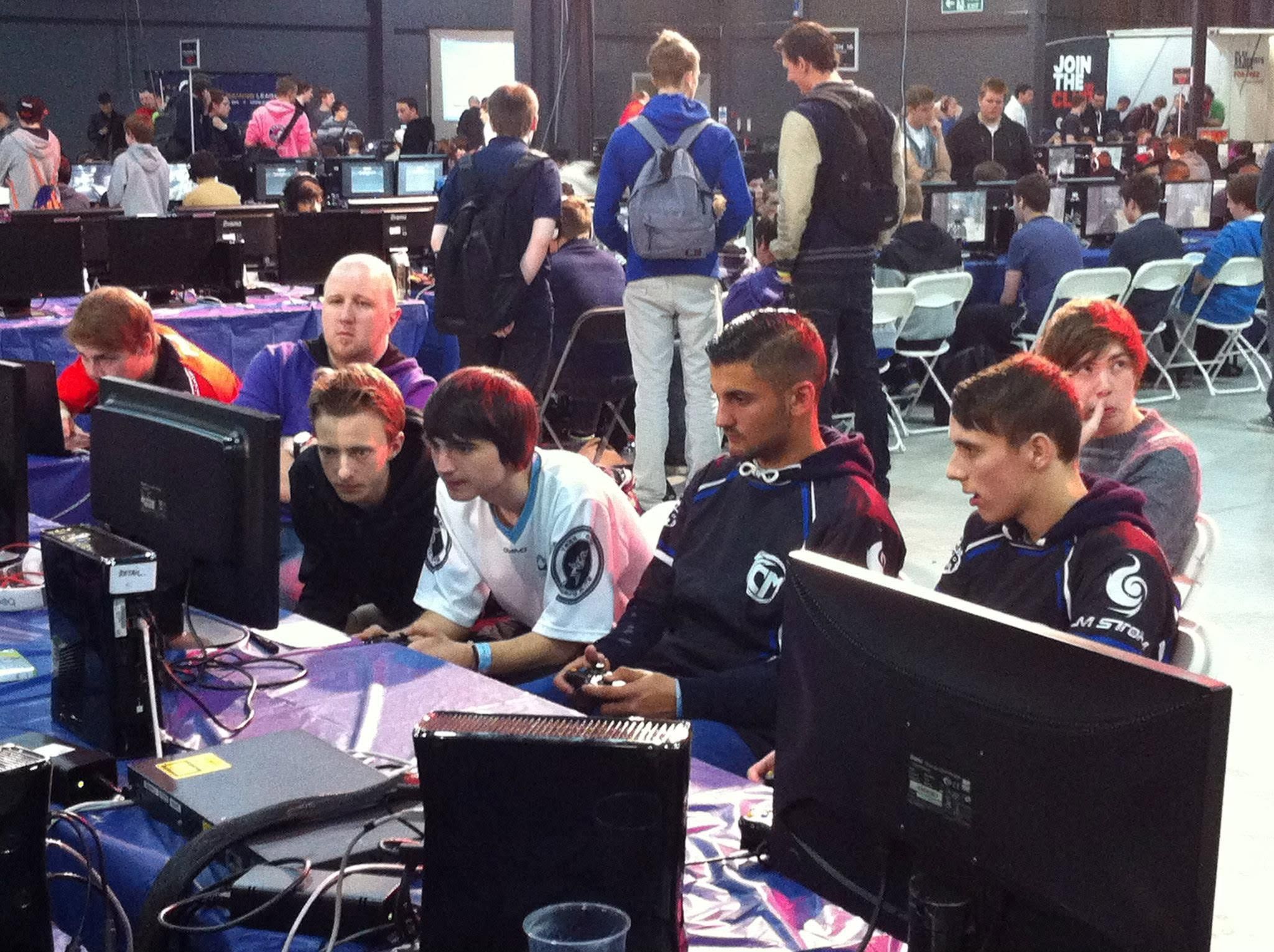 An esports tournament hall in Eindhoven. I am standing behind my players at their screens.